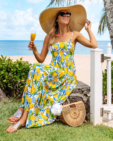 https://www.kennyflowers.com/cdn/shop/products/Positano-Resort-Dress-Kenny-Flowers-Lemon-Print-Womens-Coverup-Maxi-Dress-Amalfi-Resortwear-Luxury-Travel-Destination-Square_375x469_crop_center.jpg?v=1689357271
